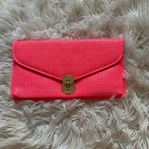 Neon pink clutch
